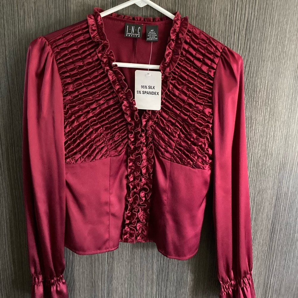 Long sleeve silk blouse with delicate ruffle front